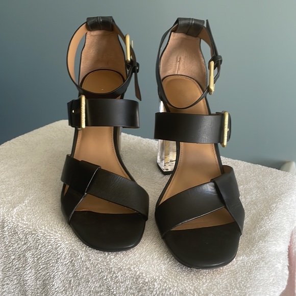 Calvin Klein- Black high heel. Heel is clear lined with a strip of gold. - Picture 6 of 7